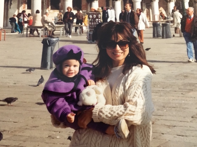 baby Alexa with mom traveling abroad
