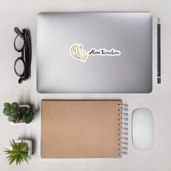 laptop with alexa tarantino logo sticker