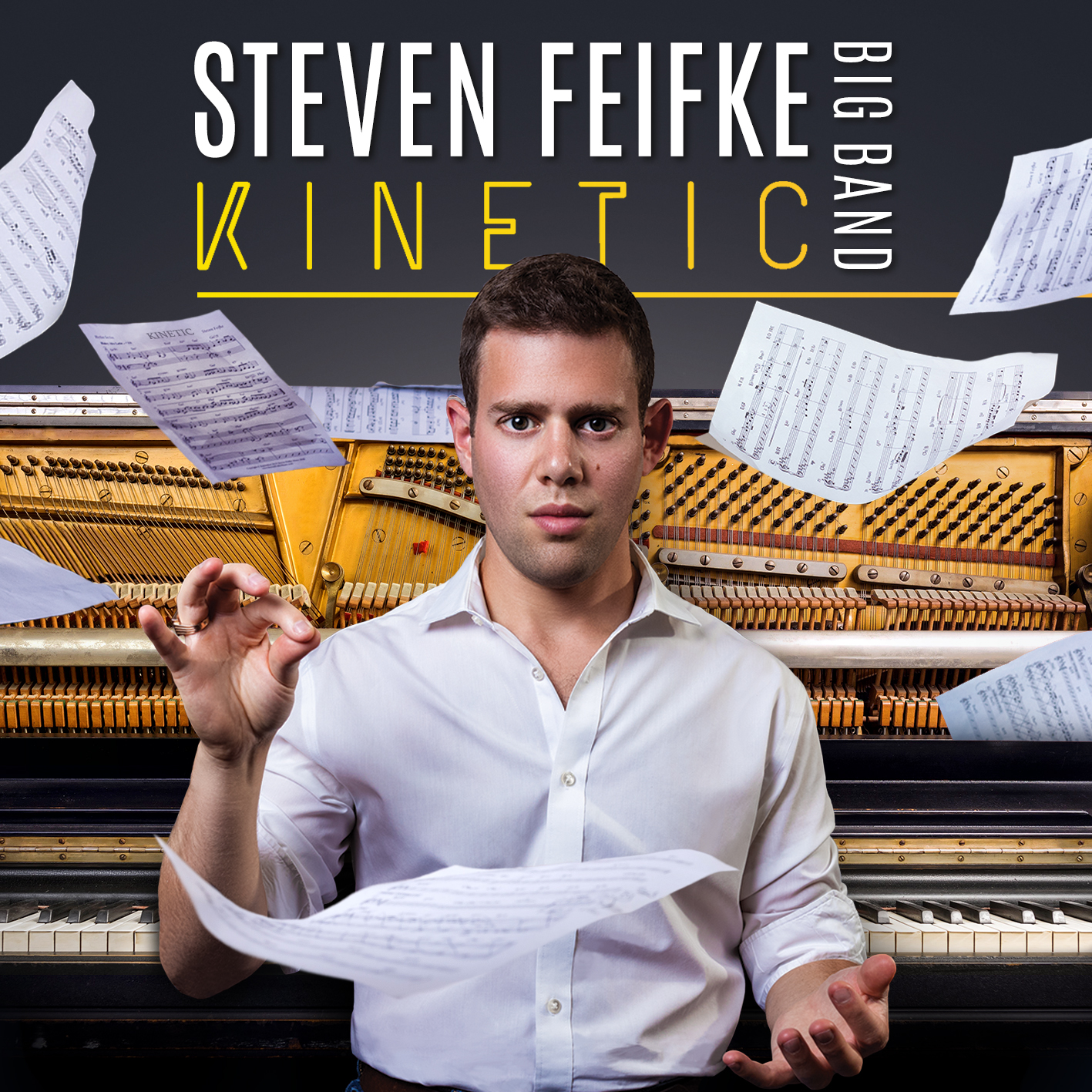 Steven Feifke Big Band Kinetic album cover - Steven in front of piano with floating sheet music